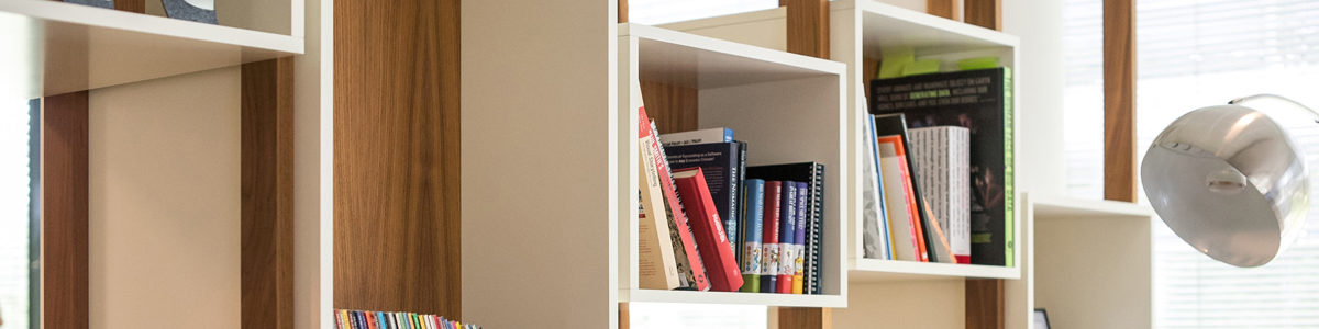 Bookshelves Photo by Arlington Research on Unsplash